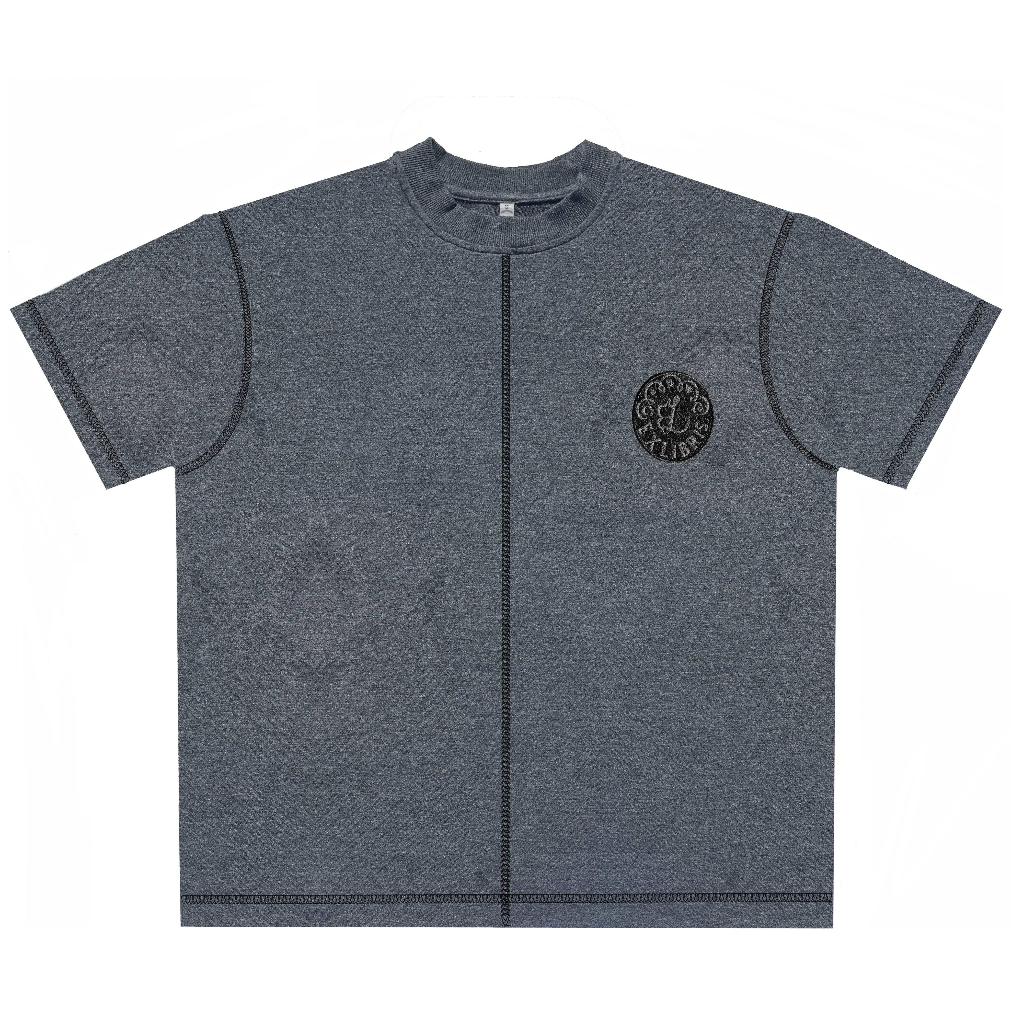 Gray short-sleeve t-shirt with black vertical seam and round logo patch on chest