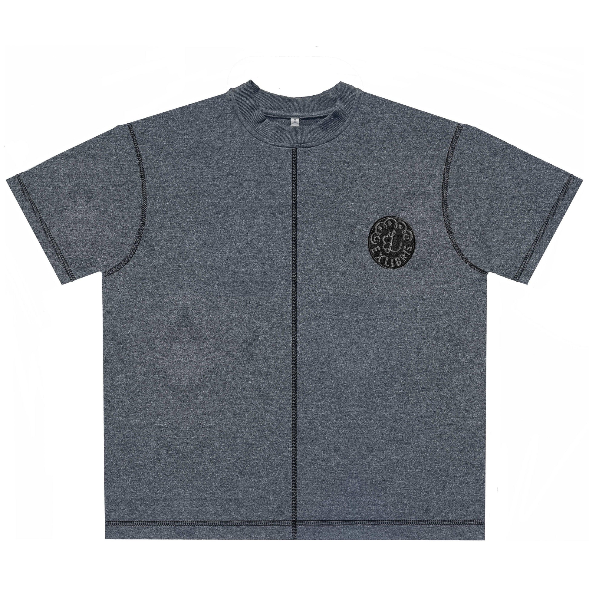 Gray short-sleeve t-shirt with black vertical seam and round logo patch on chest