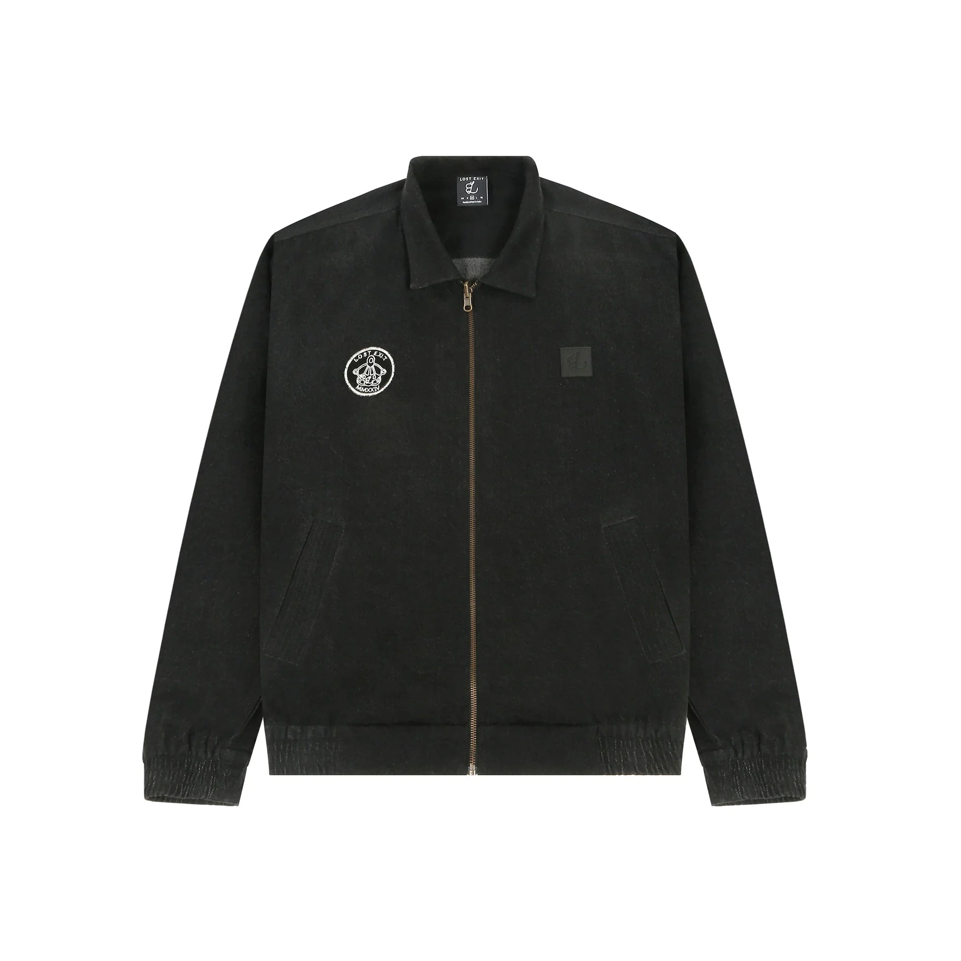 Black zip-up jacket with collar, embroidered circular patch on chest and elastic cuffs
