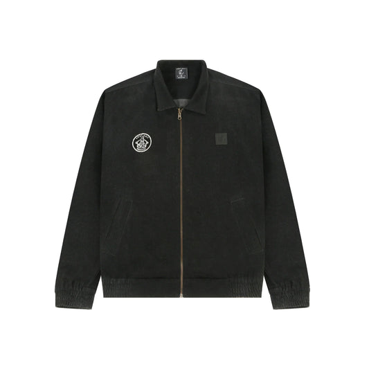 Black zip-up jacket with collar, embroidered circular patch on chest and elastic cuffs